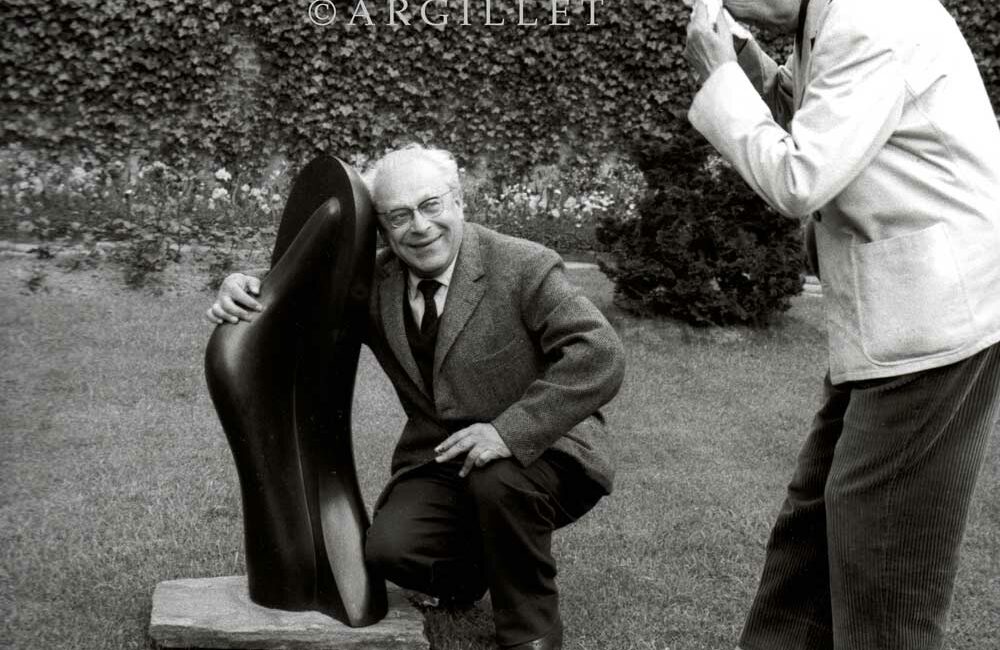Photo of Arp laughting with Tzara 1